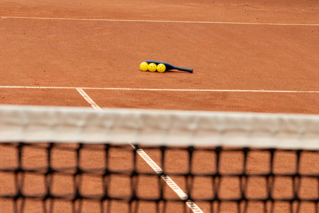 What Is The Difference Between Yellow And Orange Pickleballs?