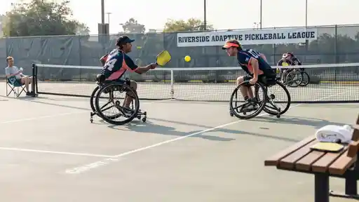 Wheelchair pickleball players competing under 2026 USAP adaptive division rules.